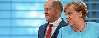 Olaf Sholz y Angela Merkel.